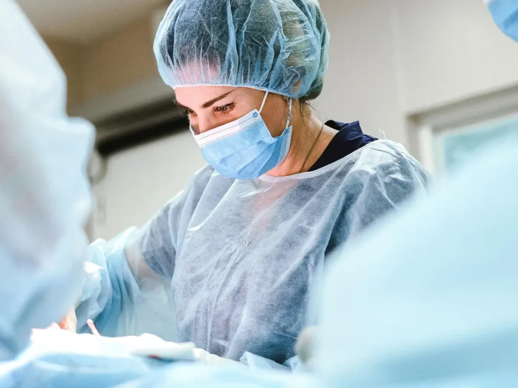 Photo by Anna Shvets: https://www.pexels.com/photo/doctor-operating-a-patient-4421494/